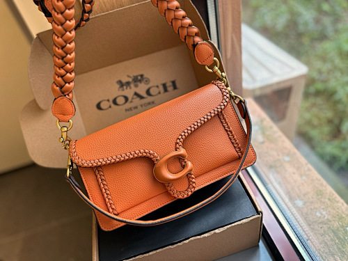 -COACH HE7825