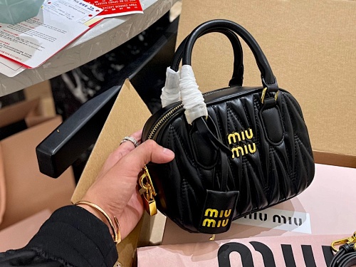 50$-MIU MIU   9836-T