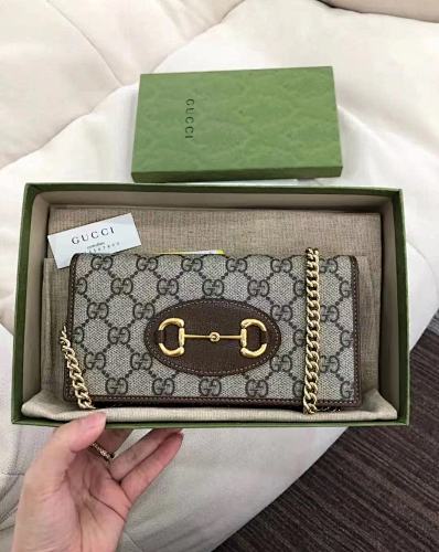 GUCCI  55$     10404-T