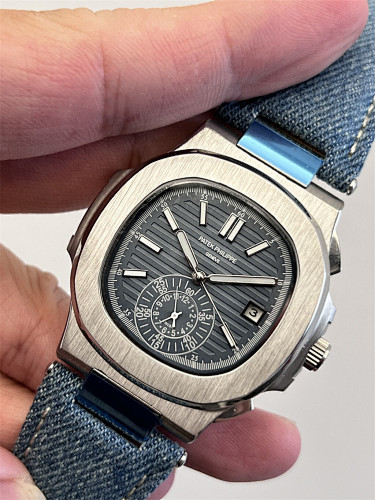 Patek Philippe Nautilus 5980 · 5716