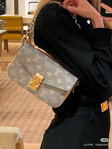 Louis Vuitton Pochette Métis East-West · 5080