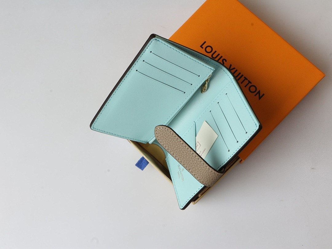 Louis Vuitton Capucines Vertical Compact Wallet · 5854 — תמונה 23