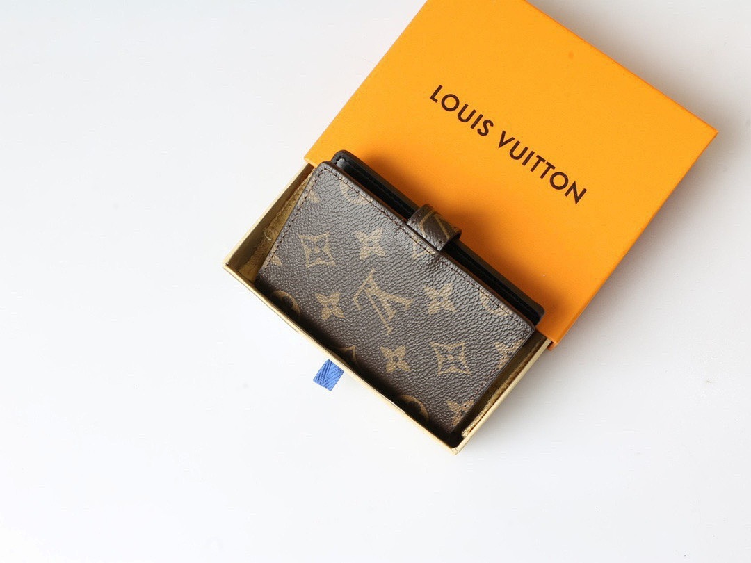 Louis Vuitton Capucines Vertical Compact Wallet · 5854 — תמונה 9