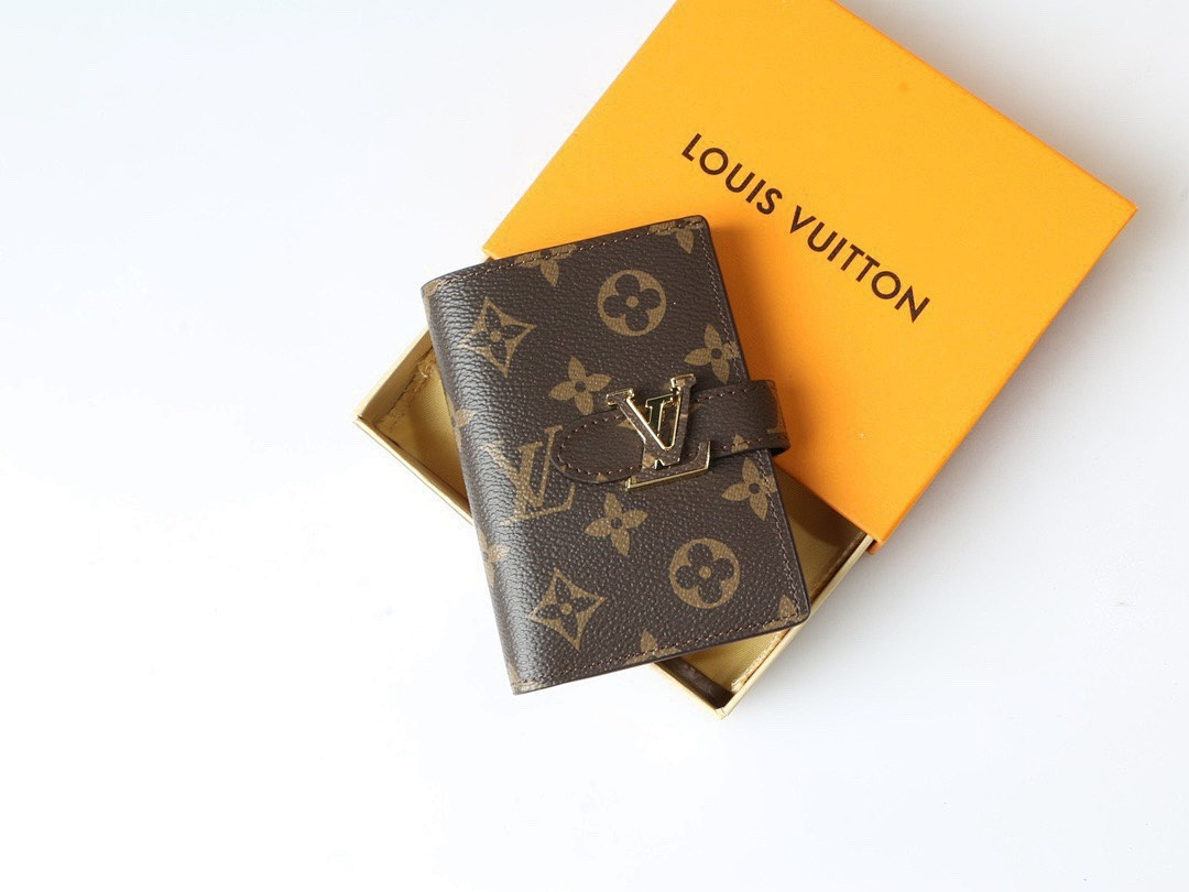 Louis Vuitton Capucines Vertical Compact Wallet · 5854 — תמונה 11