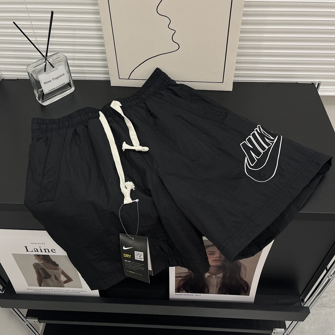 Nike Sportswear Alumni Woven Flow Shorts · A3034 — תמונה 12