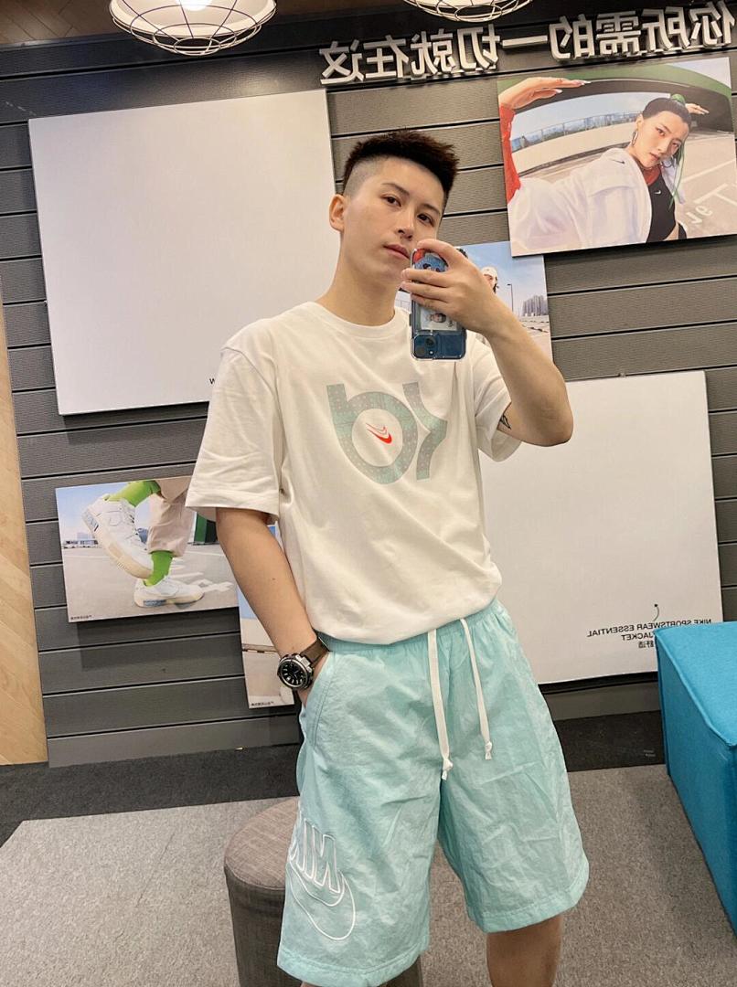 Nike Sportswear Alumni Woven Flow Shorts · A3034 — תמונה 24