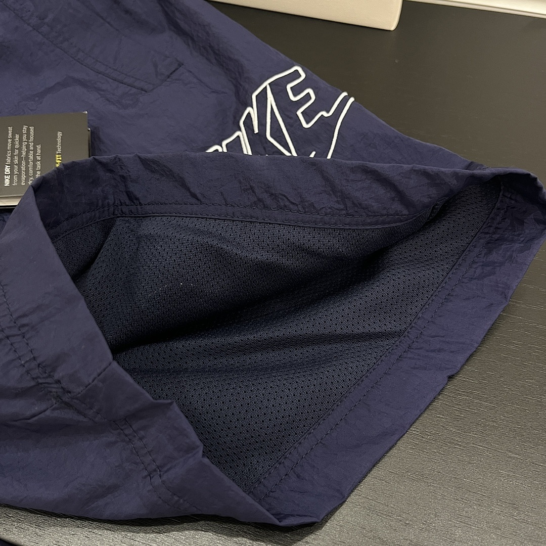 Nike Sportswear Alumni Woven Flow Shorts · A3034 — תמונה 8