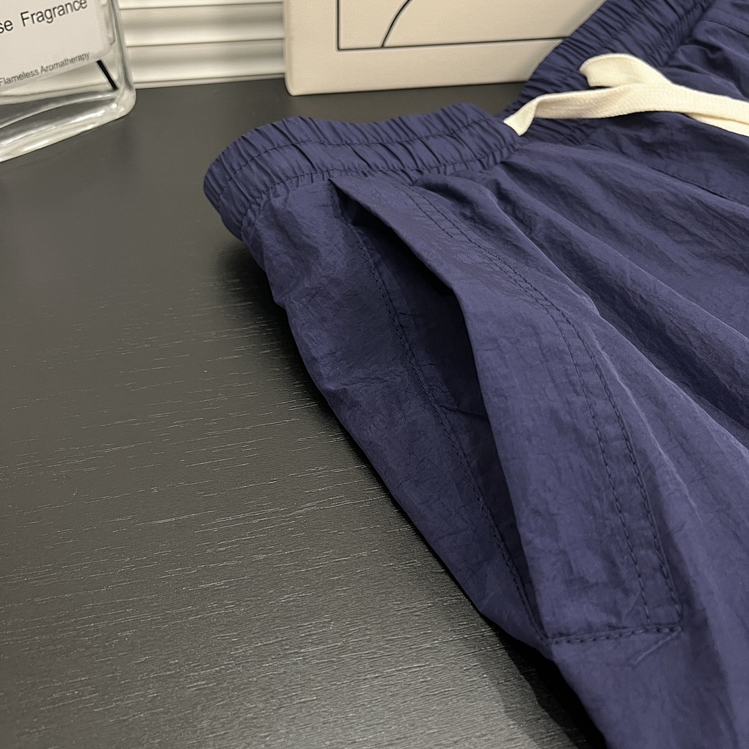 Nike Sportswear Alumni Woven Flow Shorts · A3034 — תמונה 7