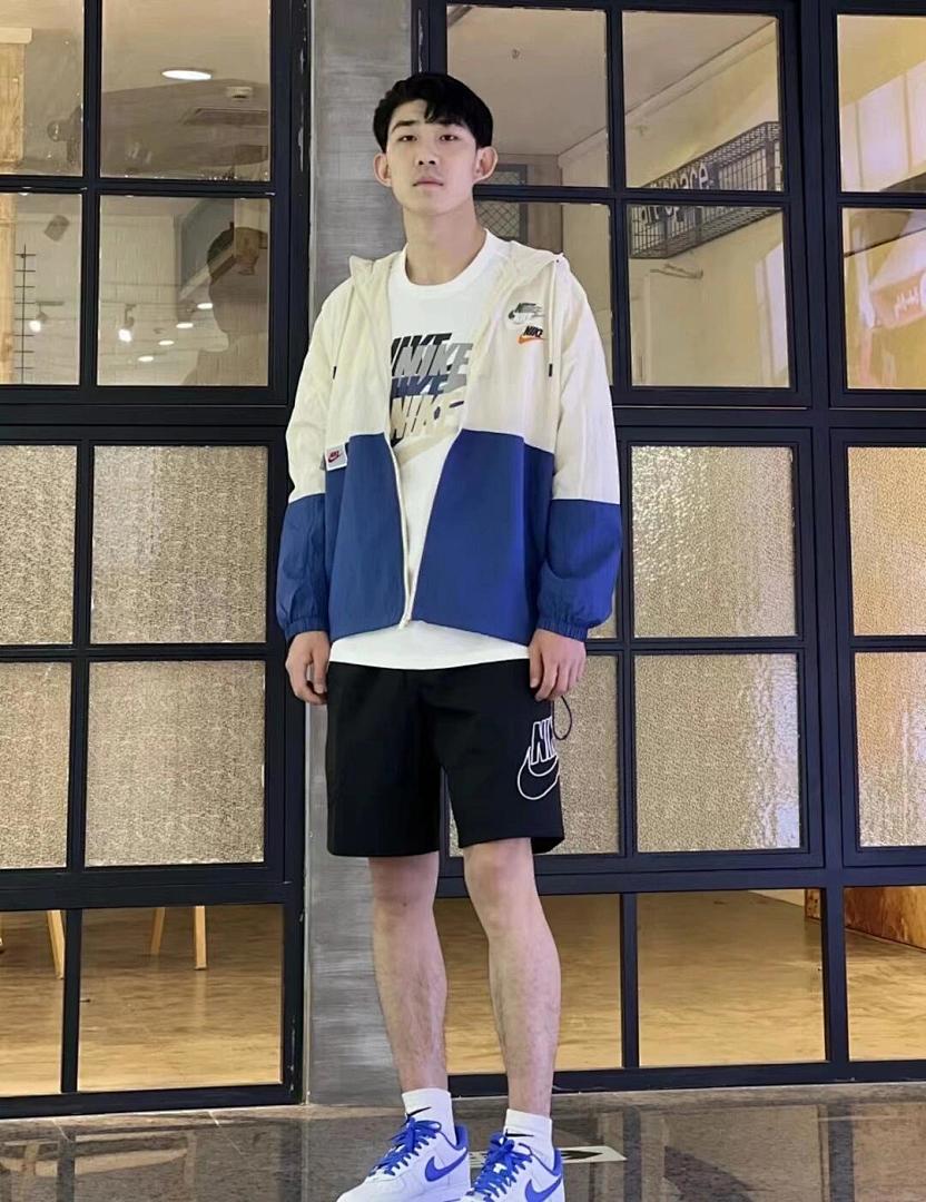 Nike Sportswear Alumni Woven Flow Shorts · A3034 — תמונה 34