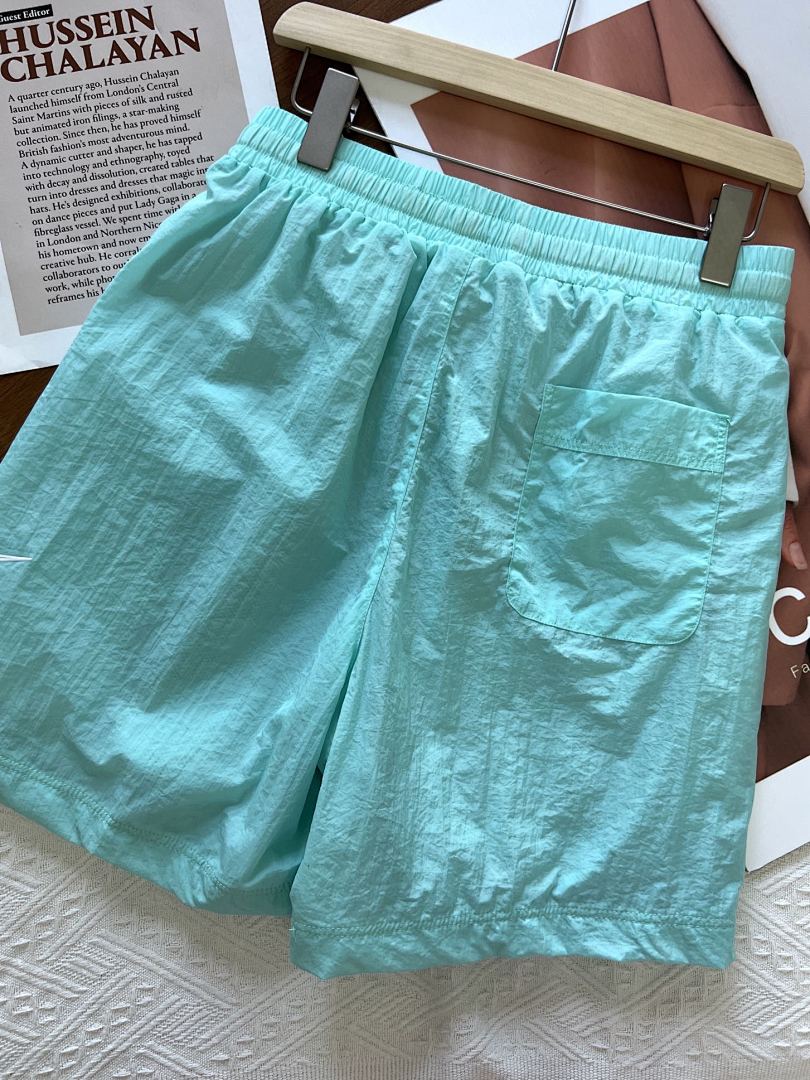 Nike Sportswear Alumni Woven Flow Shorts · A3034 — תמונה 40