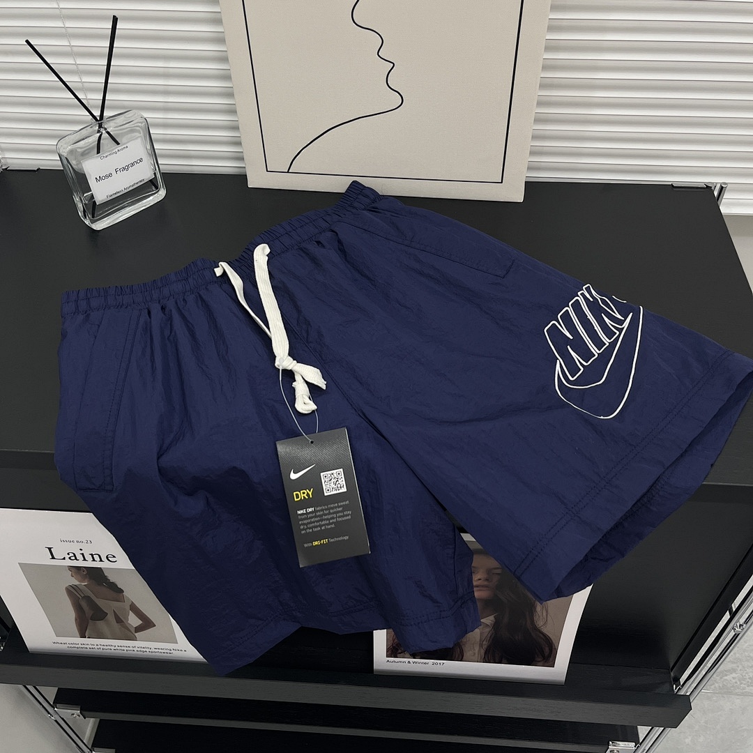 Nike Sportswear Alumni Woven Flow Shorts · A3034 — תמונה 13