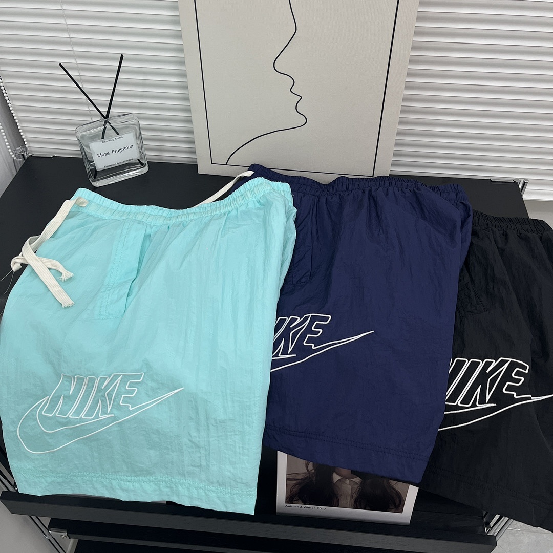 Nike Sportswear Alumni Woven Flow Shorts · A3034 — תמונה 11