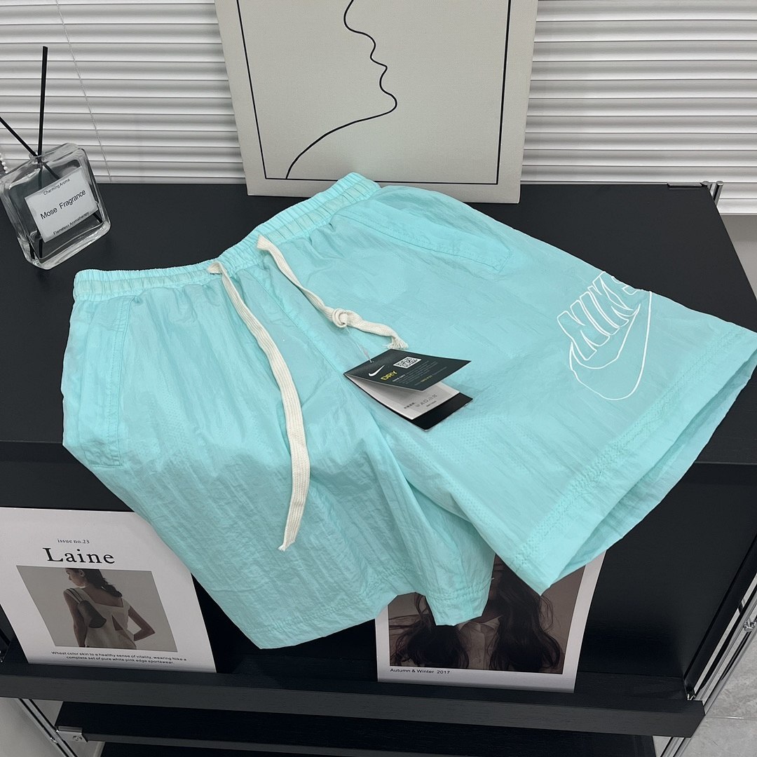 Nike Sportswear Alumni Woven Flow Shorts · A3034 — תמונה 14