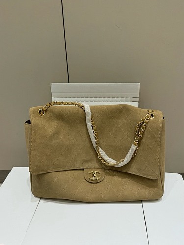 Chanel Maxi Flap Bag · K25U
